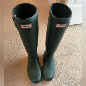 Tall green hunter boots